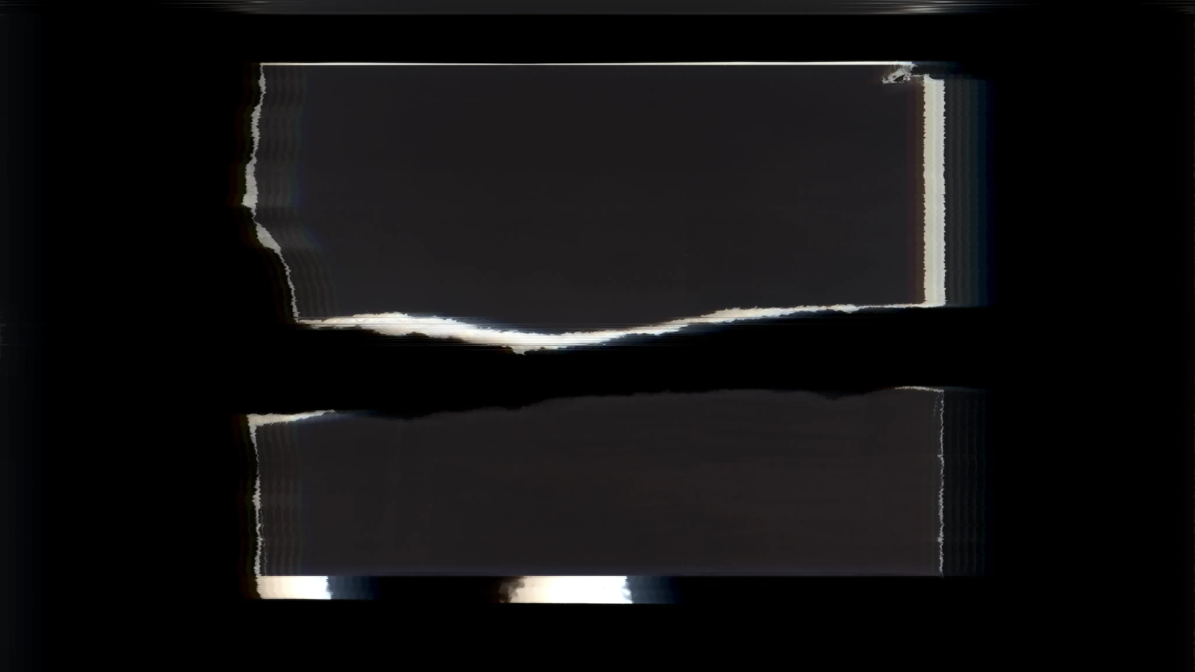 A screenshot from "Reeler" showing a torn photo frame.